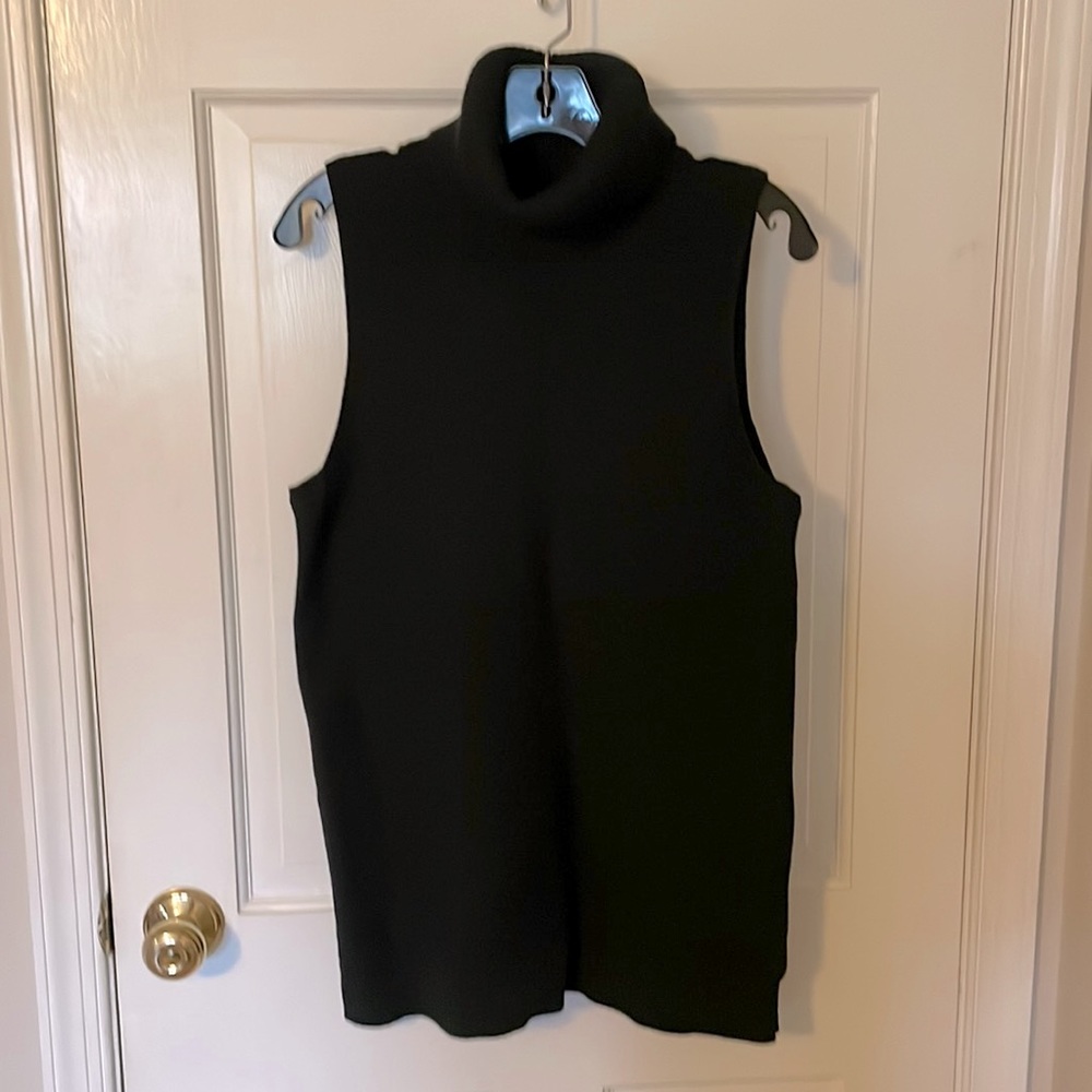 Sleeveless black turtleneck sweater